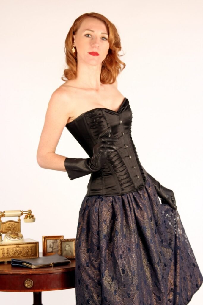 authentic steel boned corset, black steel boned corset, boned corset support, boned fashion corset, built-in bra corset, corset lingerie, corset outerwear, corset top styling, corset with bust support, full-coverage corset, genuine steel boned corset, gothic corset design, heavy-duty steel-boned corset, hips and curves corset, over the bust shapewear, overbust corset, plus-size corset options, real steel boned corset, steel boned corset, steel boned corset dress, steel boned corset for waist training, steel boned corset lingerie, steel boned corset plus size, steel boned corset top, steel boned overbust corset, steel boned overbust waist trainer, steel boned Victorian corset, strapless corset top, structured bodice, tight-lacing corset, Victorian hourglass corset, waist training
